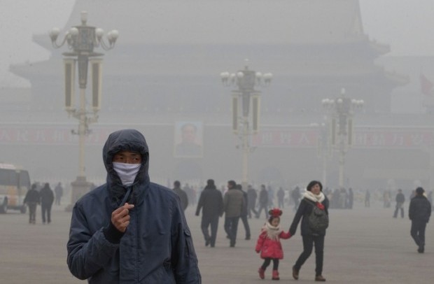 Inquinamento in Cina in piazza a Pechino dovuto al carbone